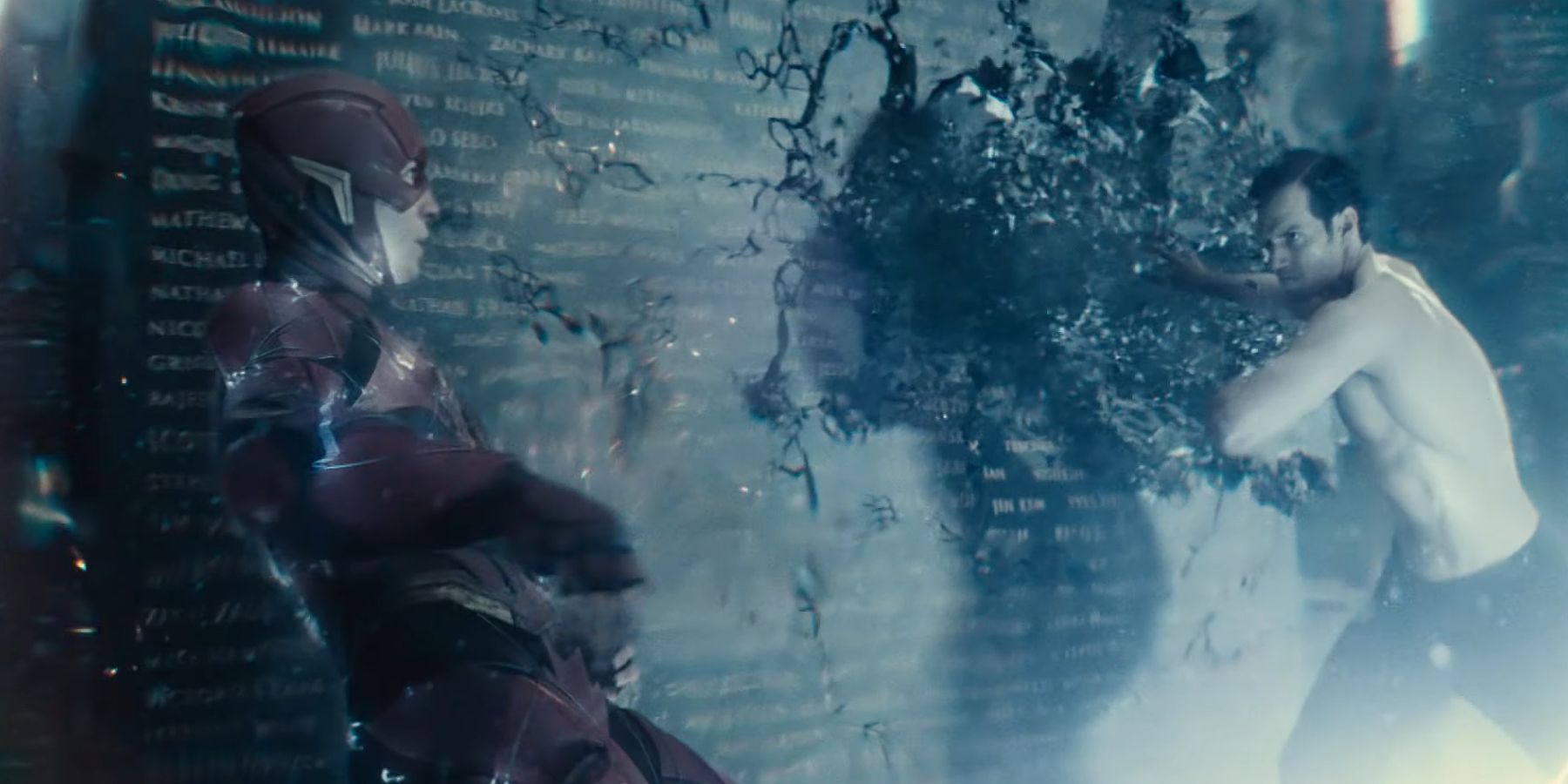 Superman smashes a memorial as he fights The Flash in Justice League