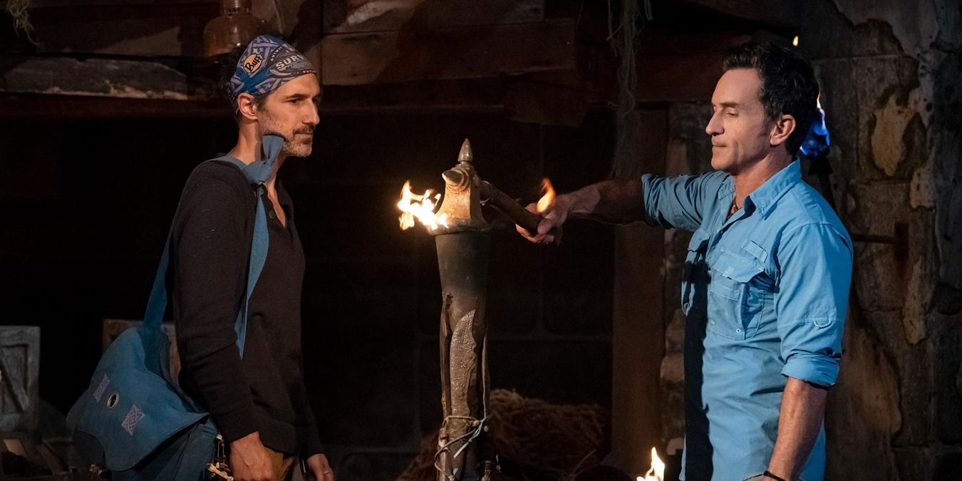 Survivor Jeff Probst snuffing Ethan Zohn's torch