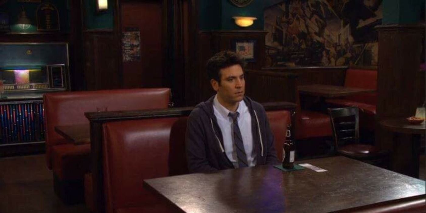 Ted sits alone in Maclarens looking at his robots vs wrestlers ticket before going to see the mother in How I MEt Your Mother