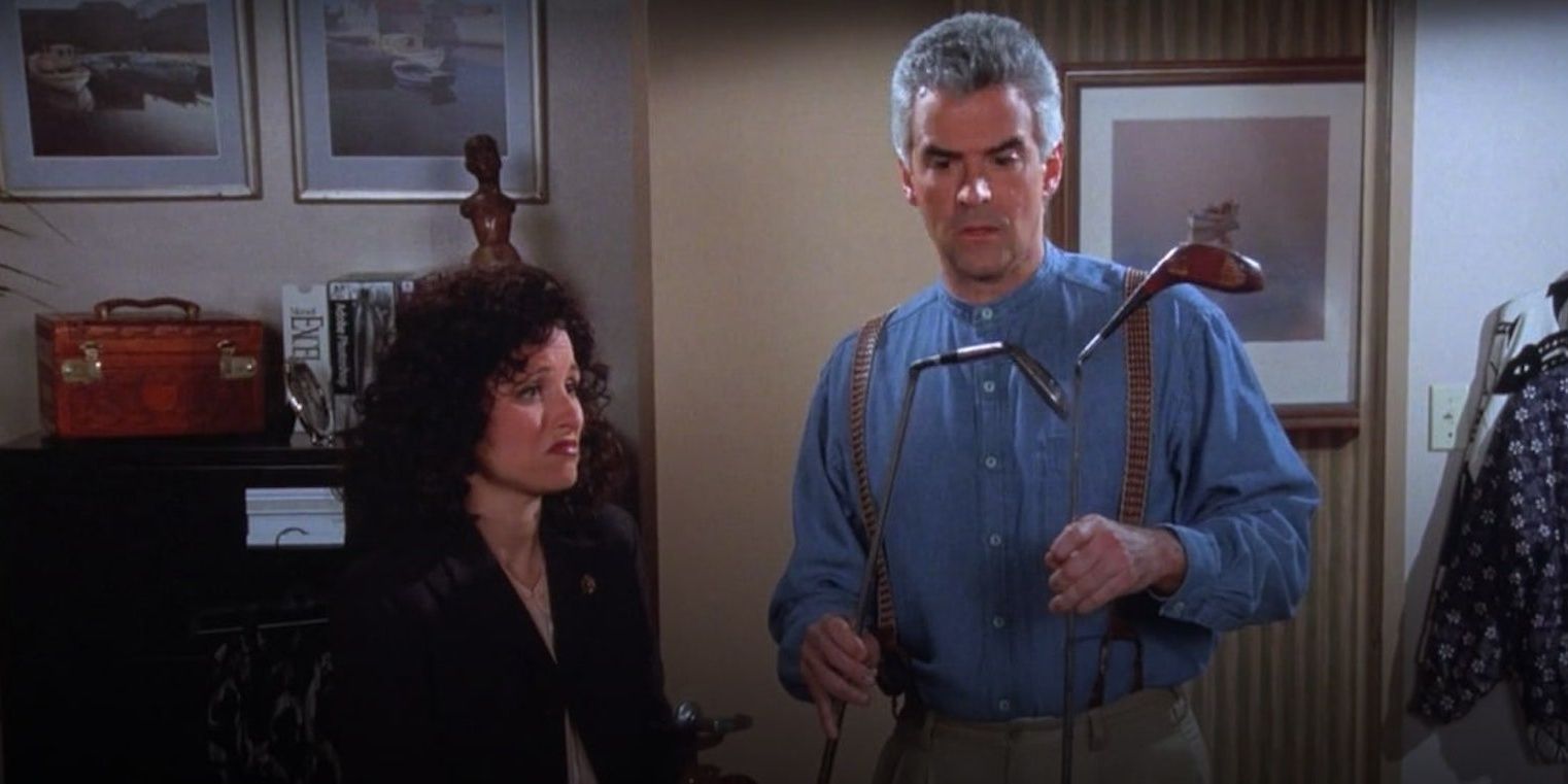 Elaine looks at Peterman holding up the mangled golf clubs