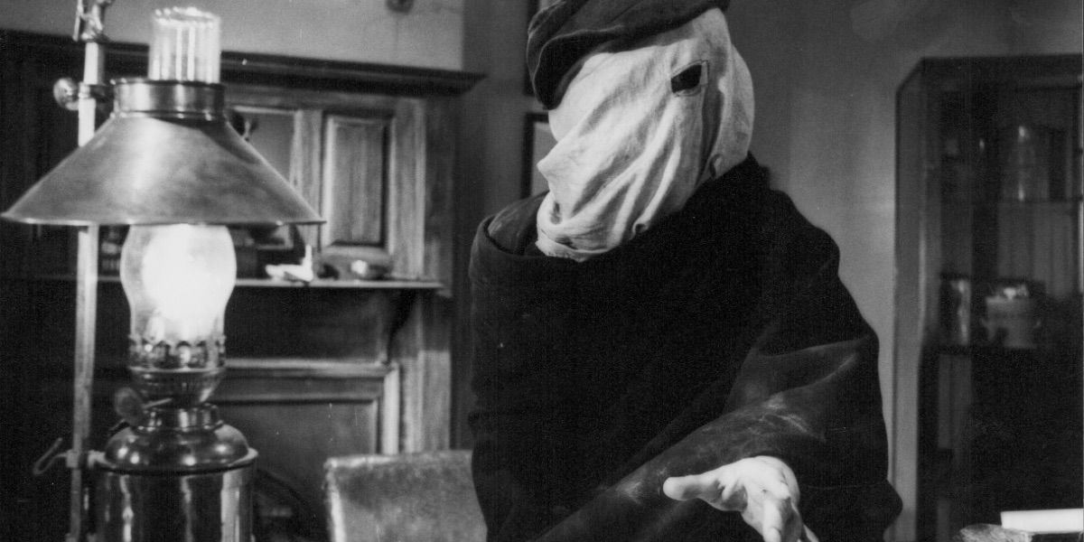 John Merick looks on with a bag on his head from The Elephant Man