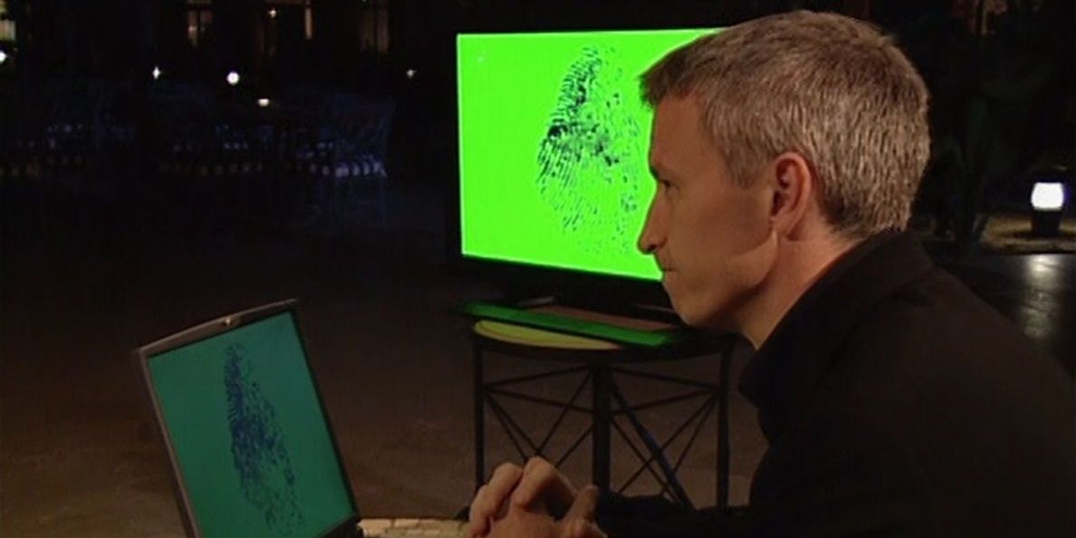 Host Anderson Cooper Sitting At Laptop in The Mole