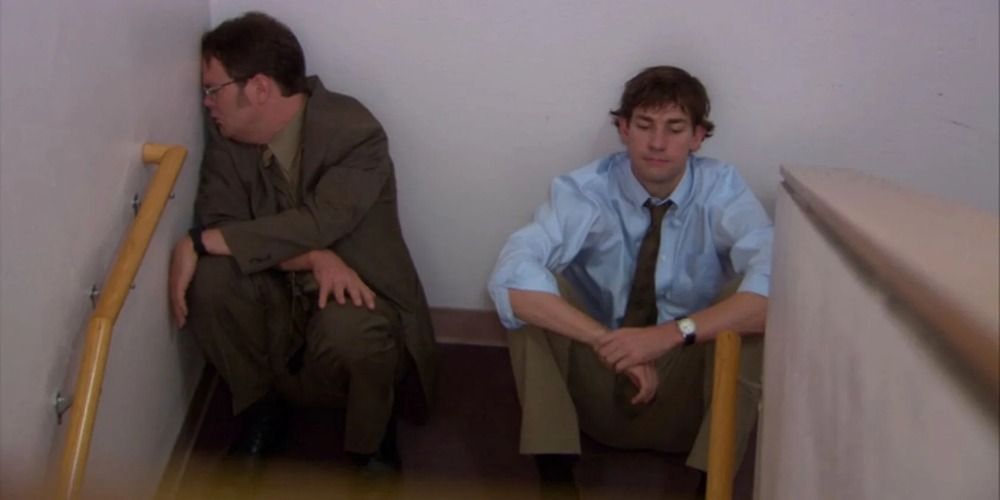 Dwight and Jim in a stairwell in The Office