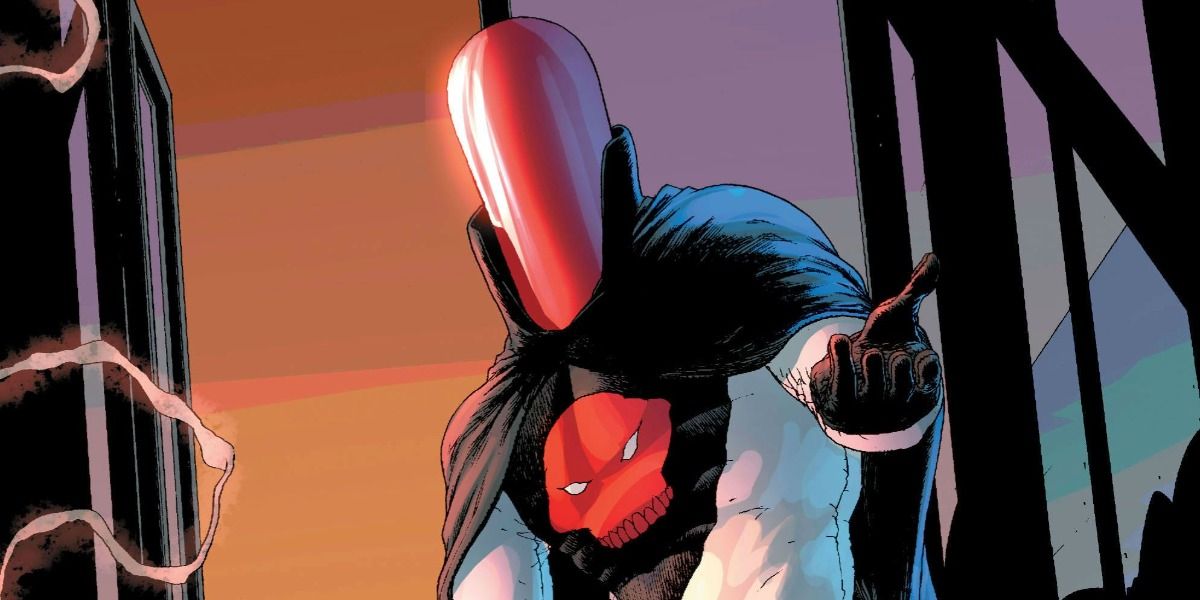 The Red Hood sits in the windowsill and holds out his hand