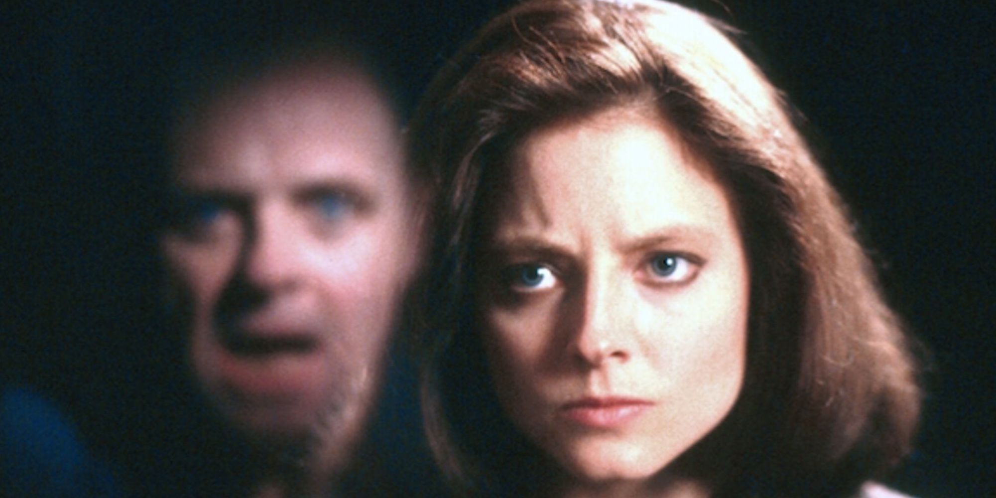 Hannibal Lecter's face reflects on the glass as he talk to Clarice in The Silence of the Lambs.