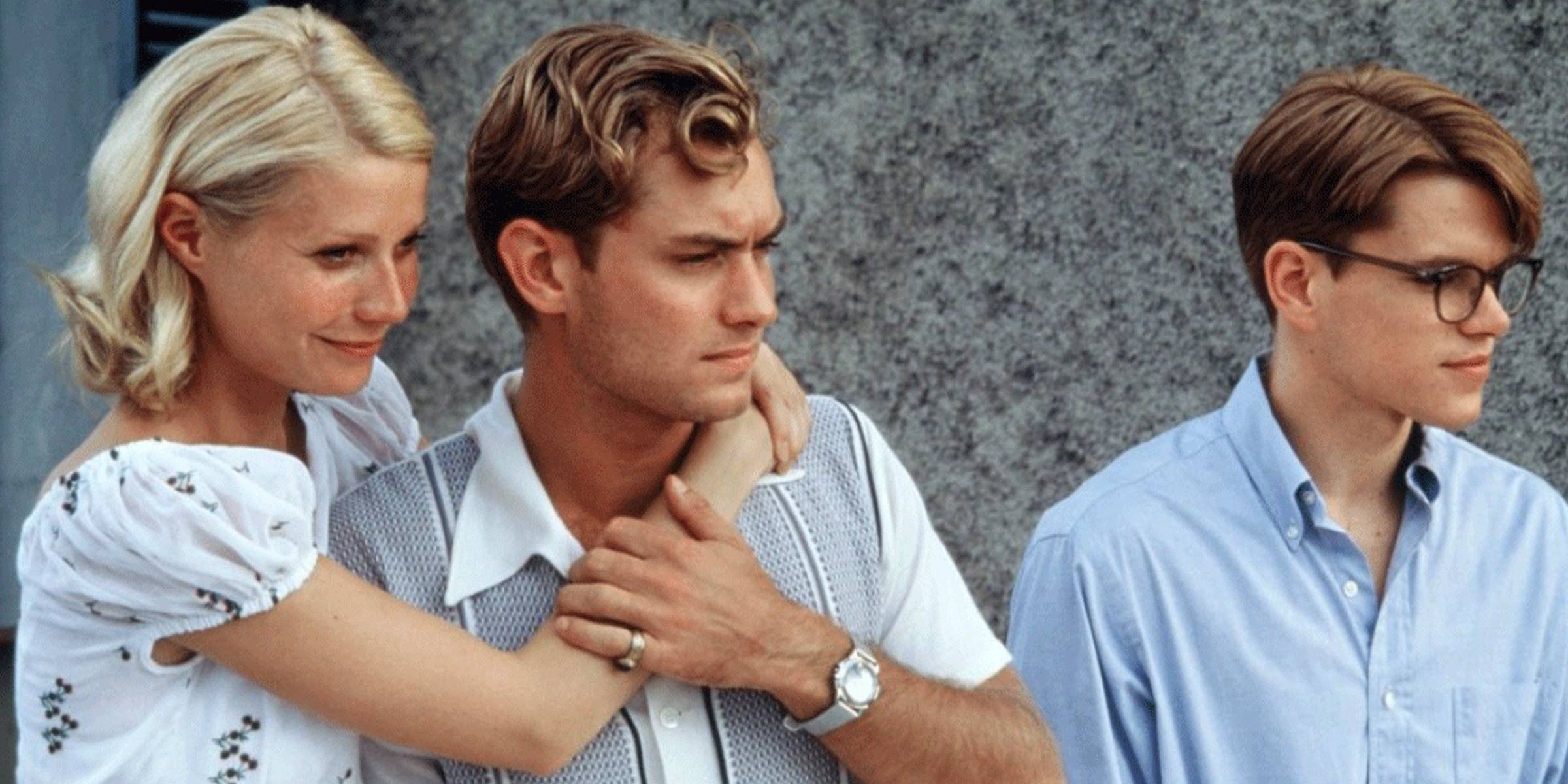 Jude Law, Matt Damon, and Gwyneth Paltrow looking off camera in The Talented Mr. Ripley.