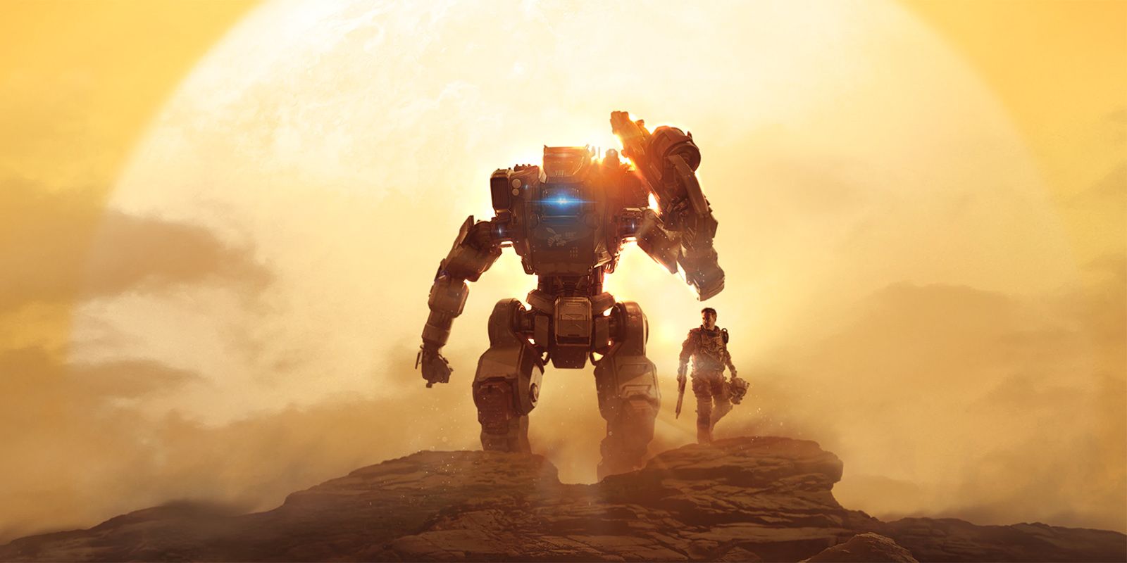 Jack Cooper from Titanfall 2 stands next to BT, his Titan as the sun sets behind them.