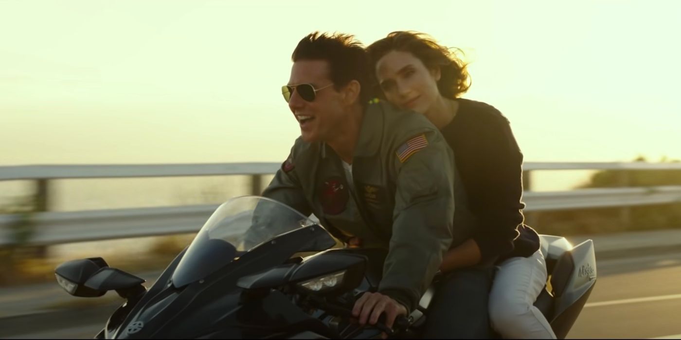 Tom Cruise and Jennifer Connelly ride a motorcycle in Top Gun Maverick