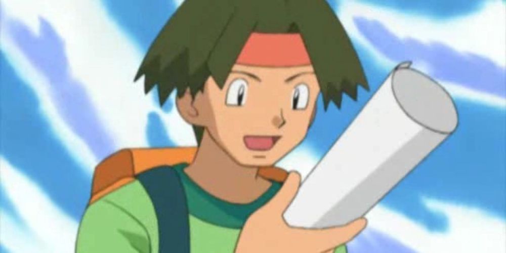 Tracy holding a map in the Pokémon anime