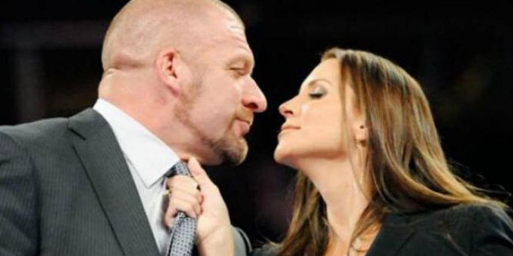 Triple H and Stephanie McMahon kissing