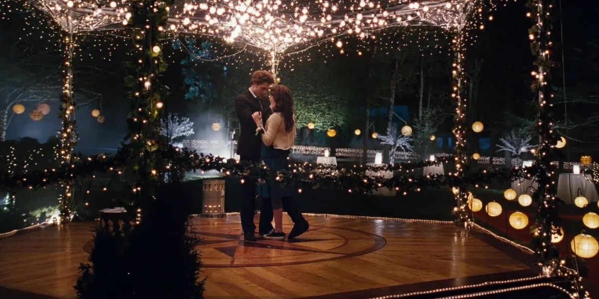 Edward and Bella dance together under the twinkling lights at prom in Twilight.