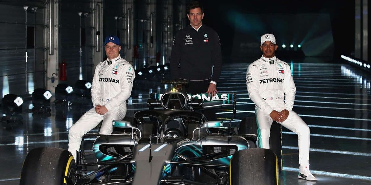Mercedes teammates Hamilton and Bottas pose for a phot before a race