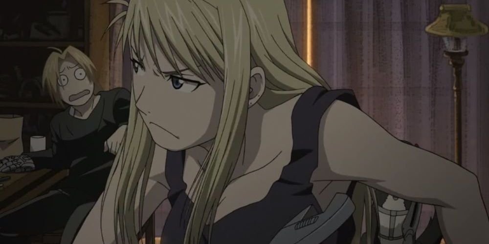 Winry turns her gaze upon Edward after kicking people out of her room in Full Metal Alchemist Brotherhood.