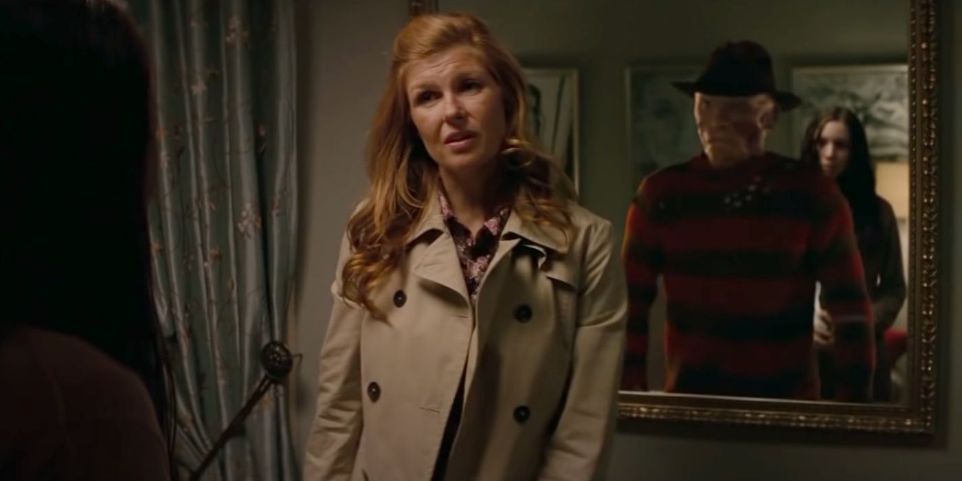 Connie Britton standing in front of Freddy in mirror A Nightmare on Elm Street 2010