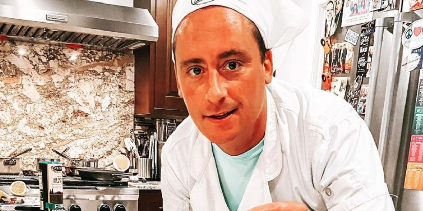 Ben Robinson wearing chef's whites and hat in galley on Below Deck Med