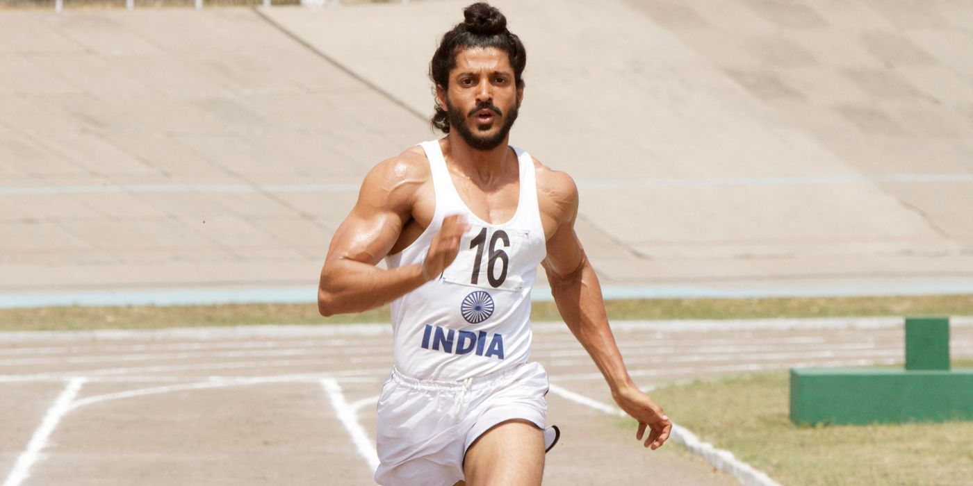Milkha Singh running on a track.