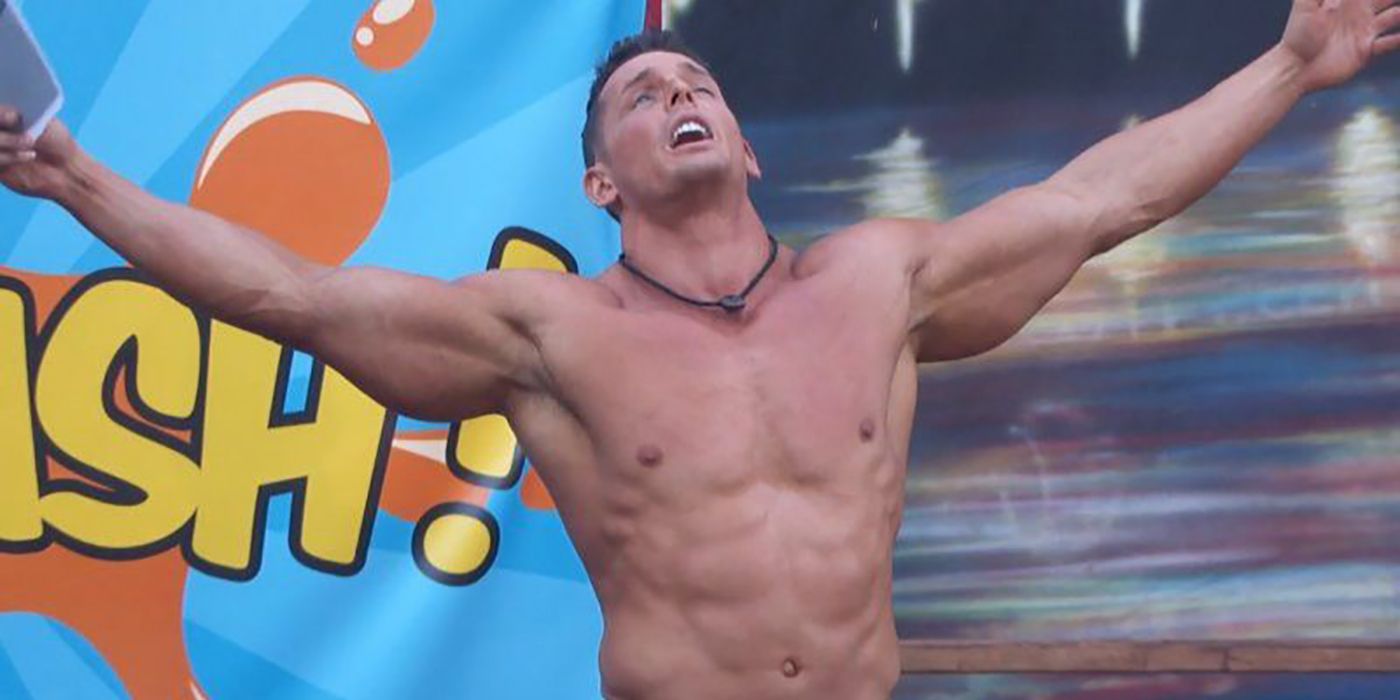 Jessie from Big Brother with his arms in the air and his head back