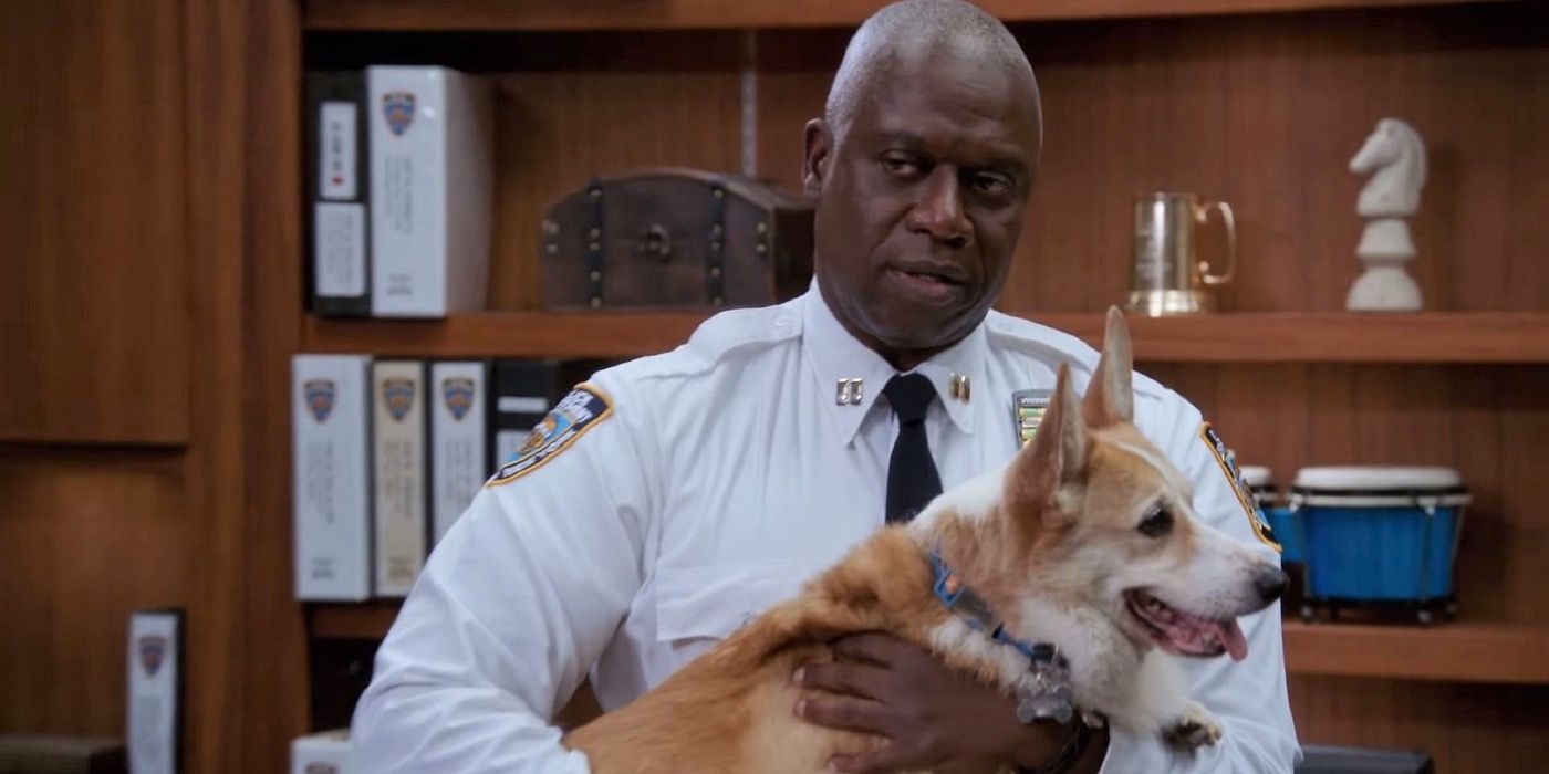 Capitão Holt e seu cachorro, Cheddar.