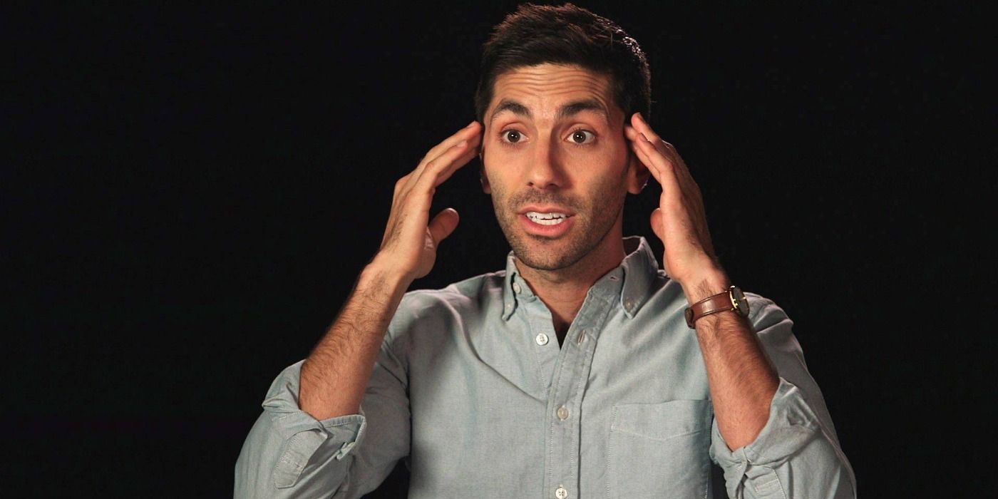 Nev in front of a black screen with his hands on his temples in Catfish: The Untold Stories Part 10.