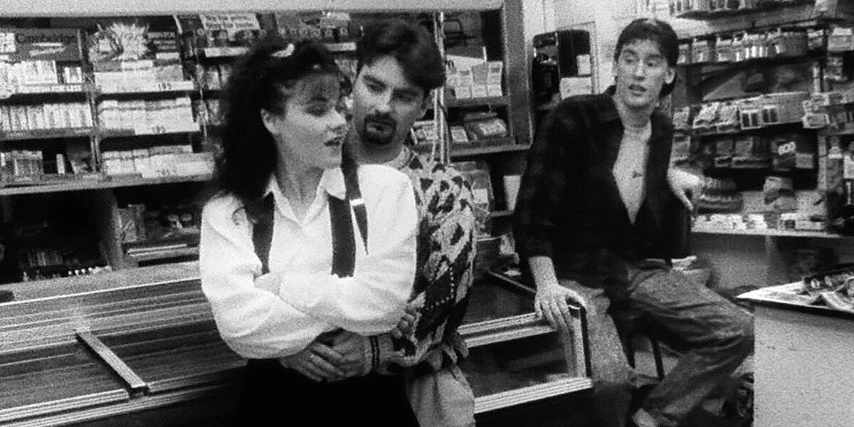 The gang hanging out at a counter in Clerks