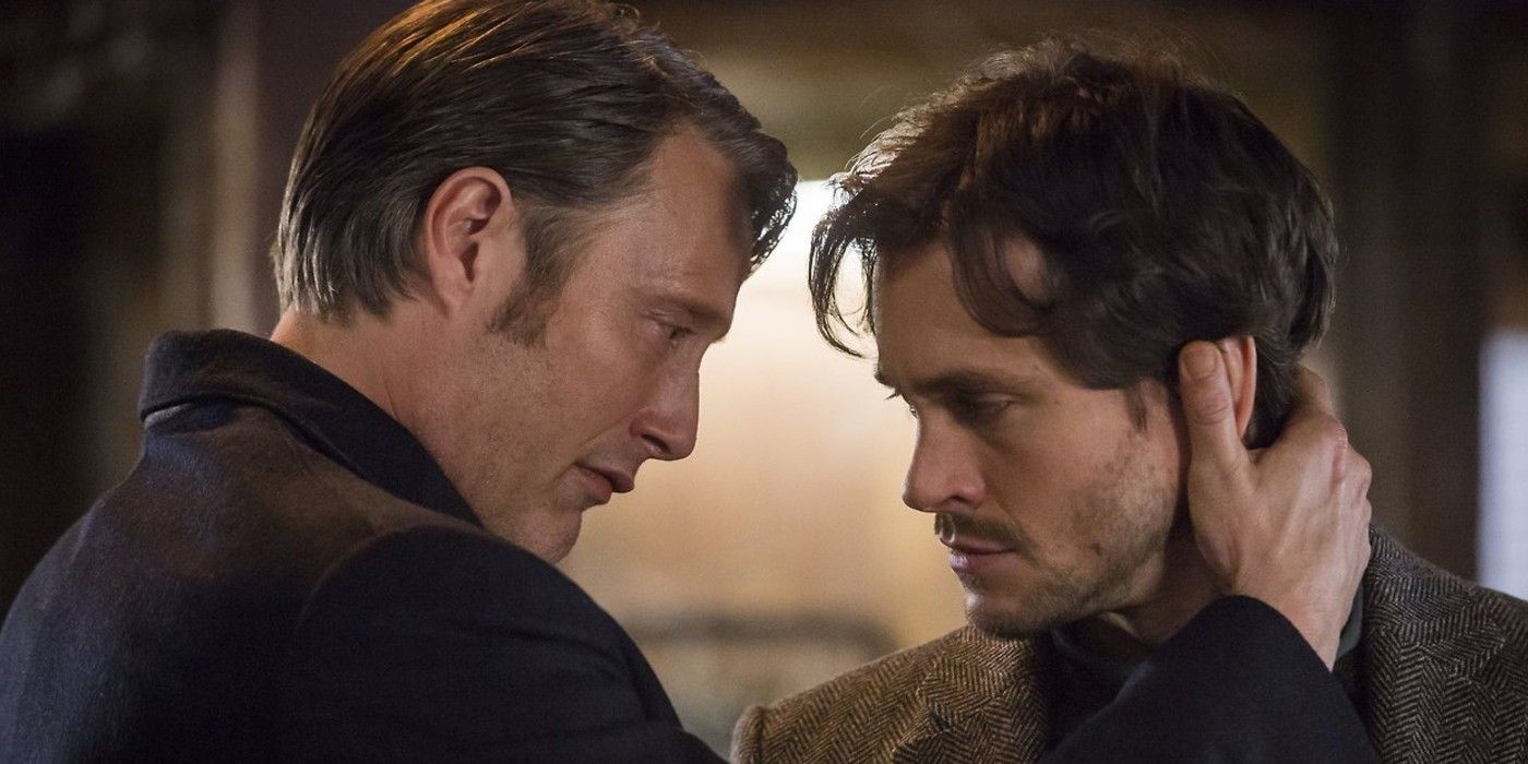 Hannibal grabs Will by the back of the next in Hannibal