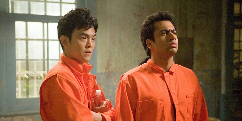 Harold and Kumar wear orange jumpsuits in Harold &amp; Kumar Escape From Guantanamo Bay