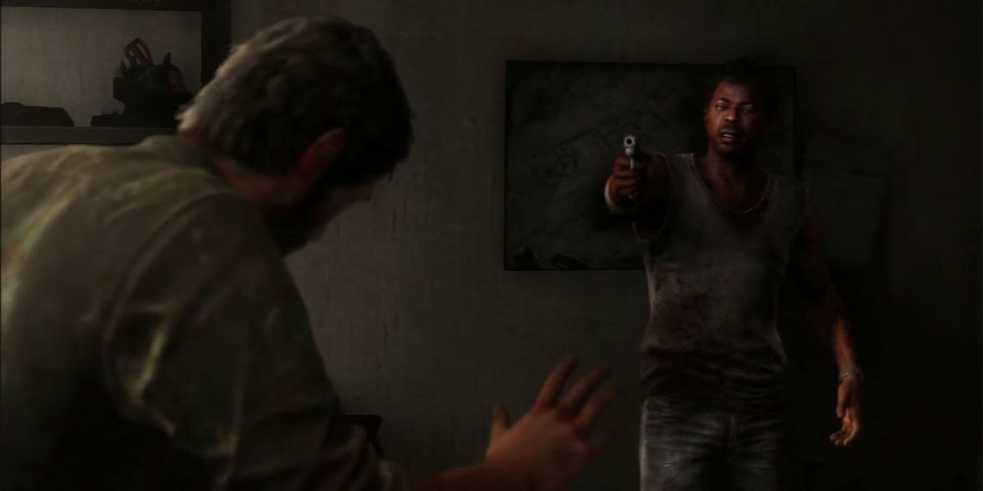 The Last of Us Part 1 Henry pointing a gun at Joel