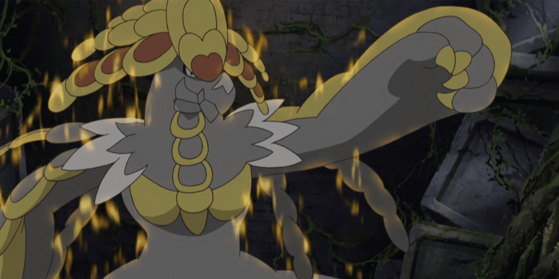 Kommo-o stretches one of its arms in the Pokemon anime series.