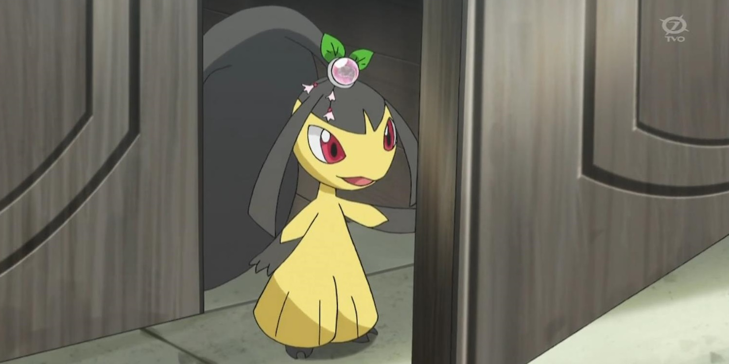 A Mawile opens a door and steps into a room in the Pokémon anime