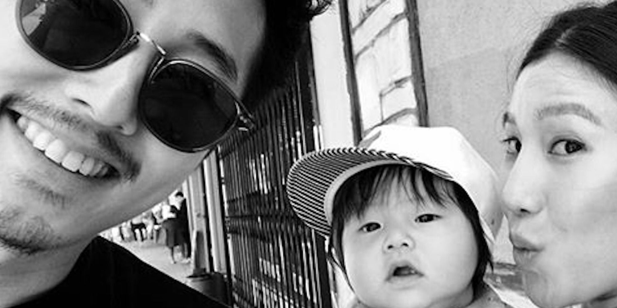 steven yeun of The walking dead poses with wife joana and son jude