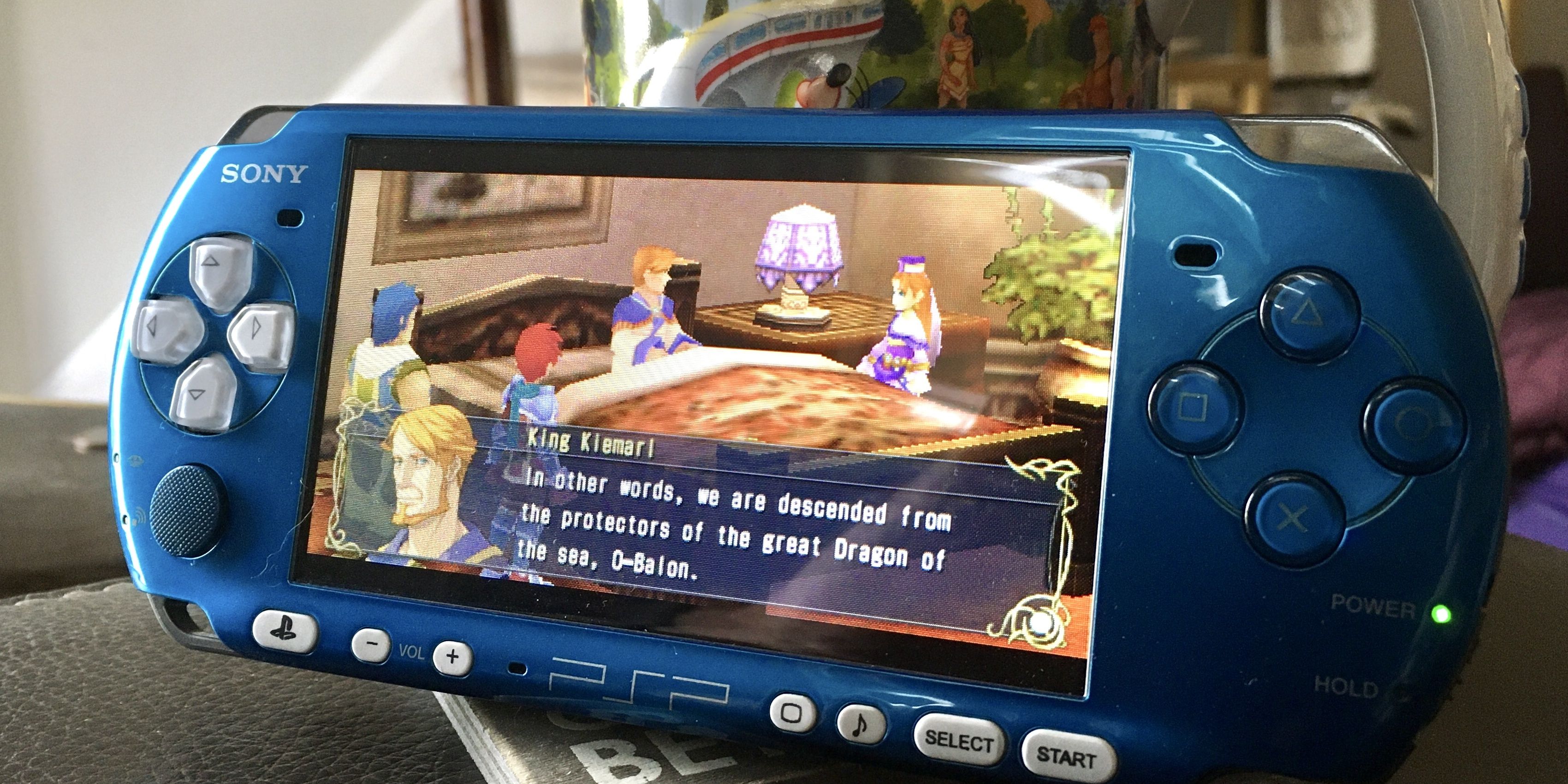 The blue PSP playing a game