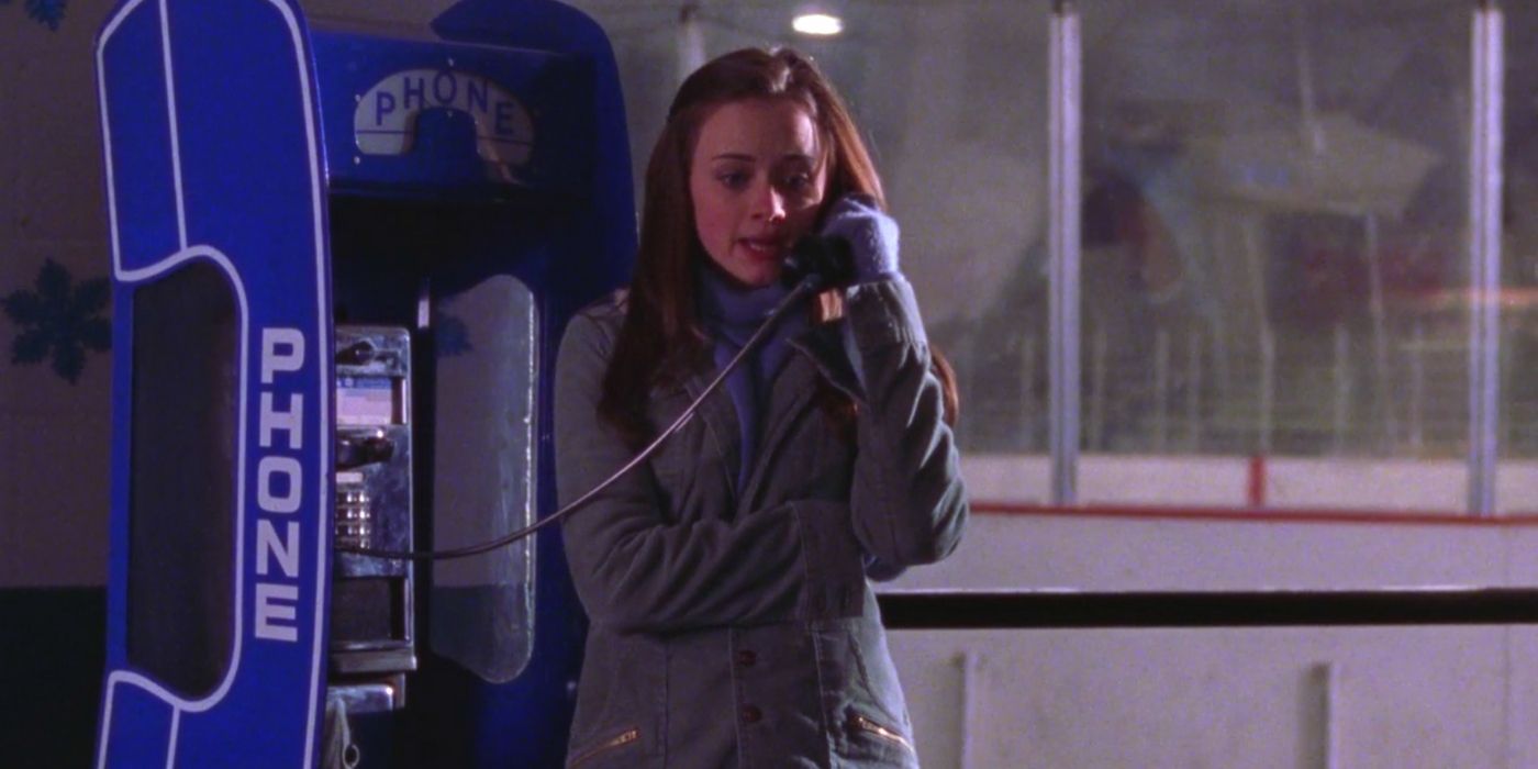 Rory talking on a payphone at the hockey game in Gilmore Girls