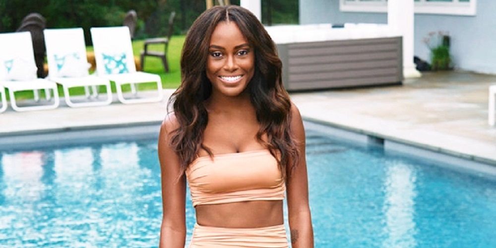Ciara poses in front of pool for Summer House