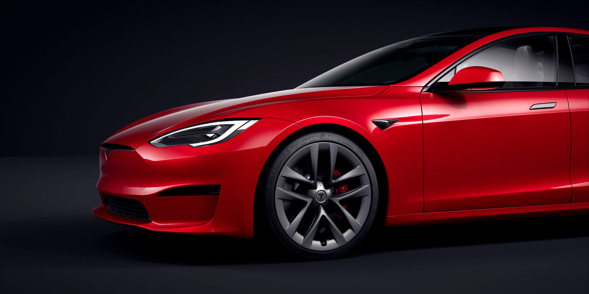The front of a red Tesla Model S