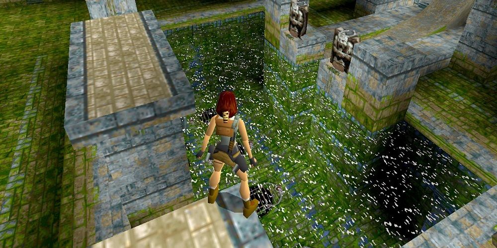 Lara overlooks water in Tomb Raider