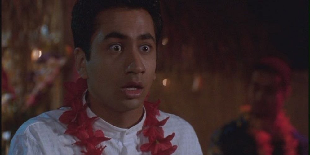 Shocked Taj wears lei in Van Wilder