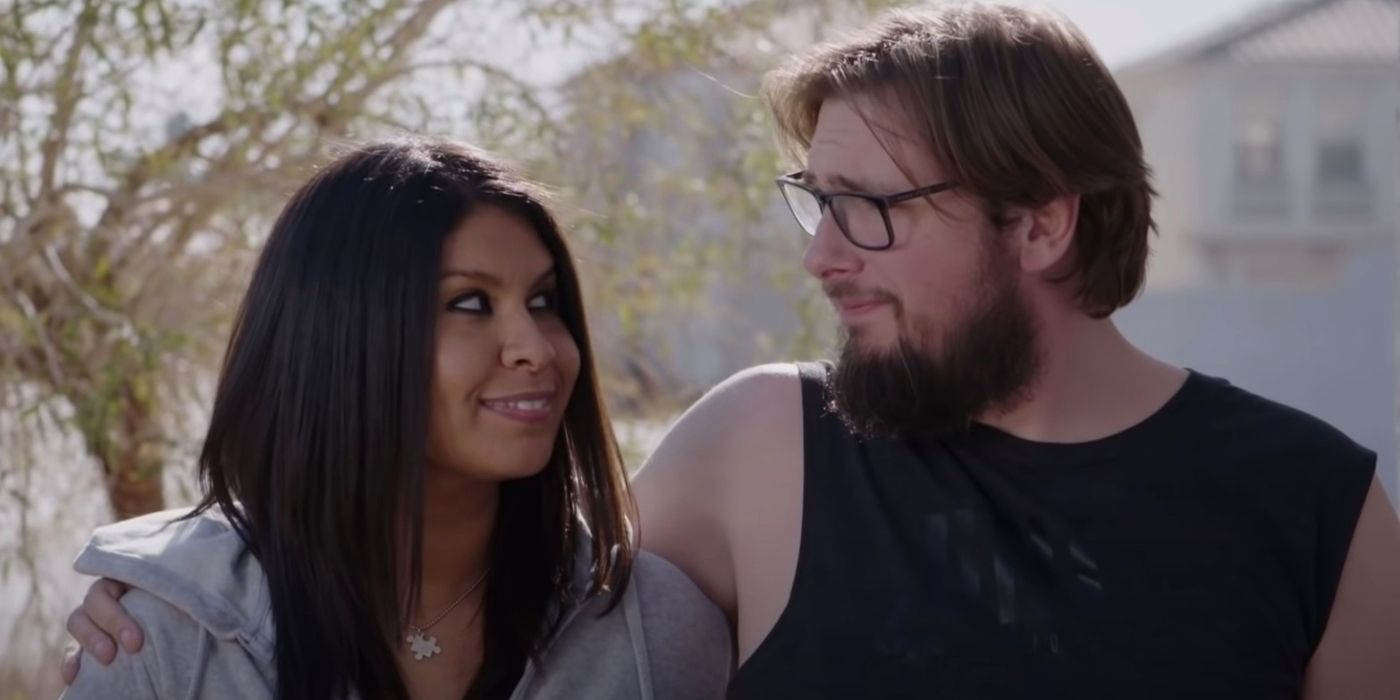 Colt and Vanessa look at eachother on 90 Day Fiance
