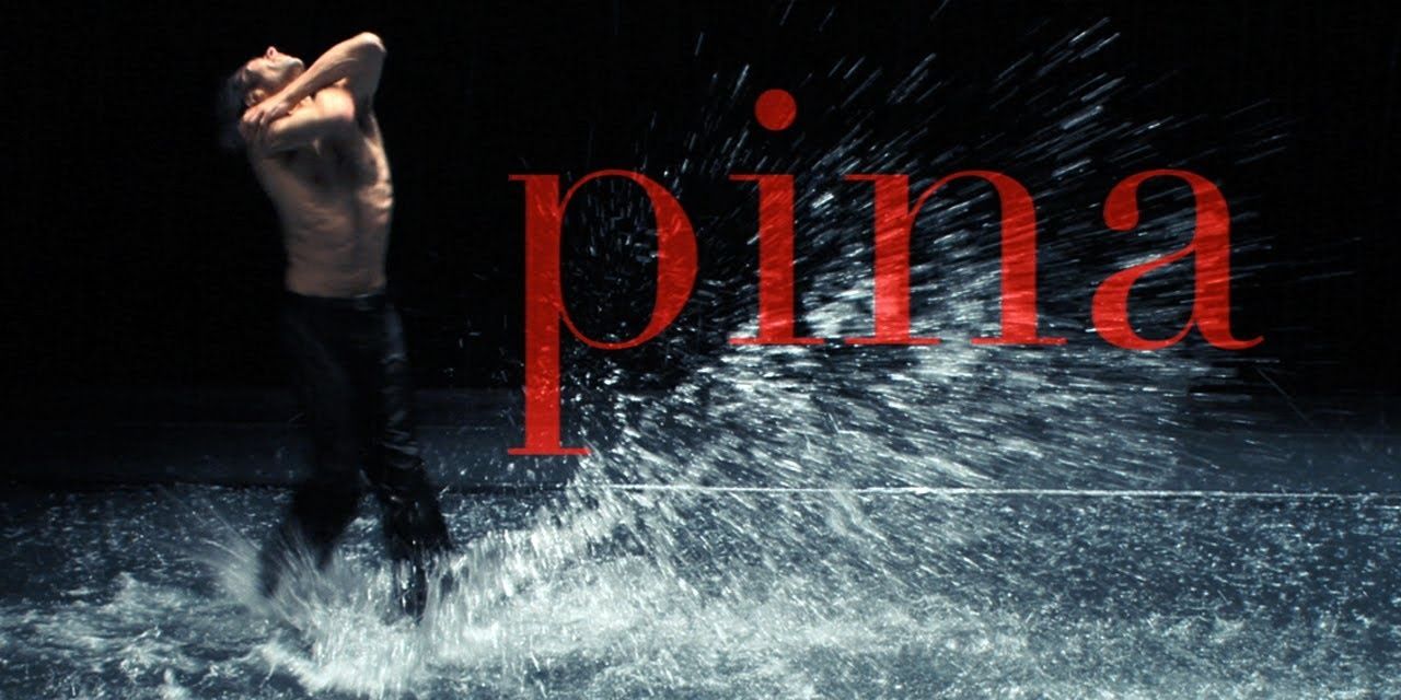 A contemporary dancer performing on water in a still from Pina