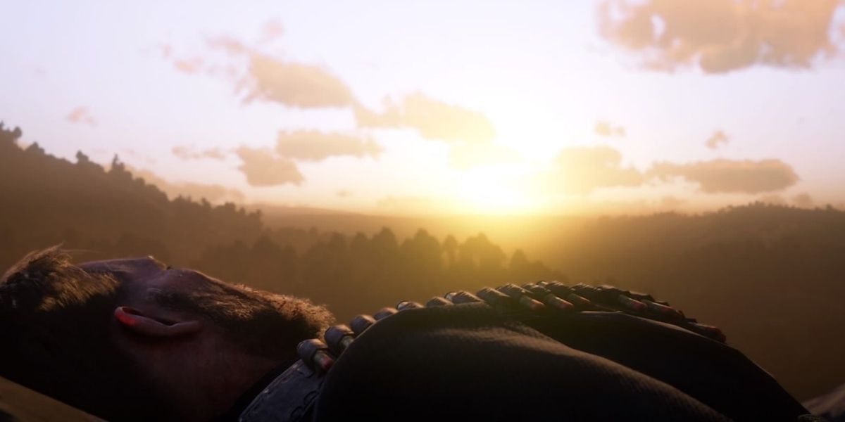 Arthur Morgan faces the sun as he lays dying