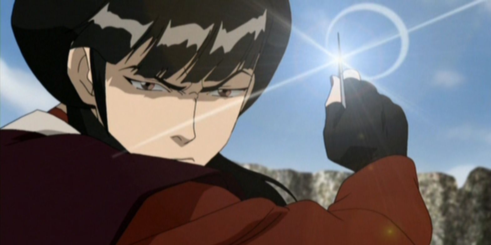 Mai holding one of her throwing knives in Avatar: The Last Airbender using throwing stars.