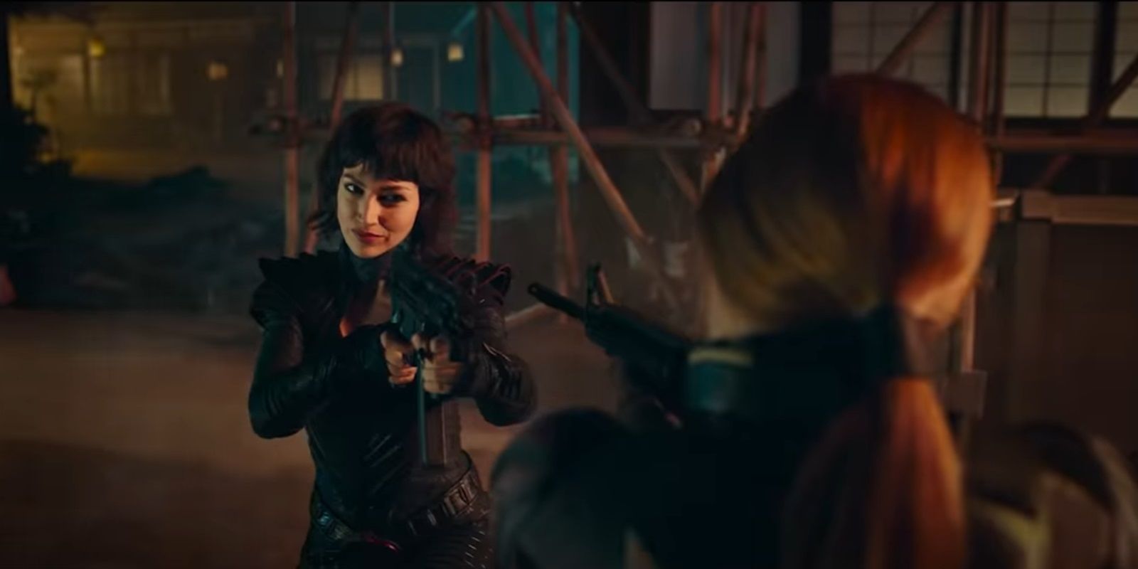 The Baroness Fights Scarlett with both aiming their guns at each other in Snake Eyes GI Joe Origins