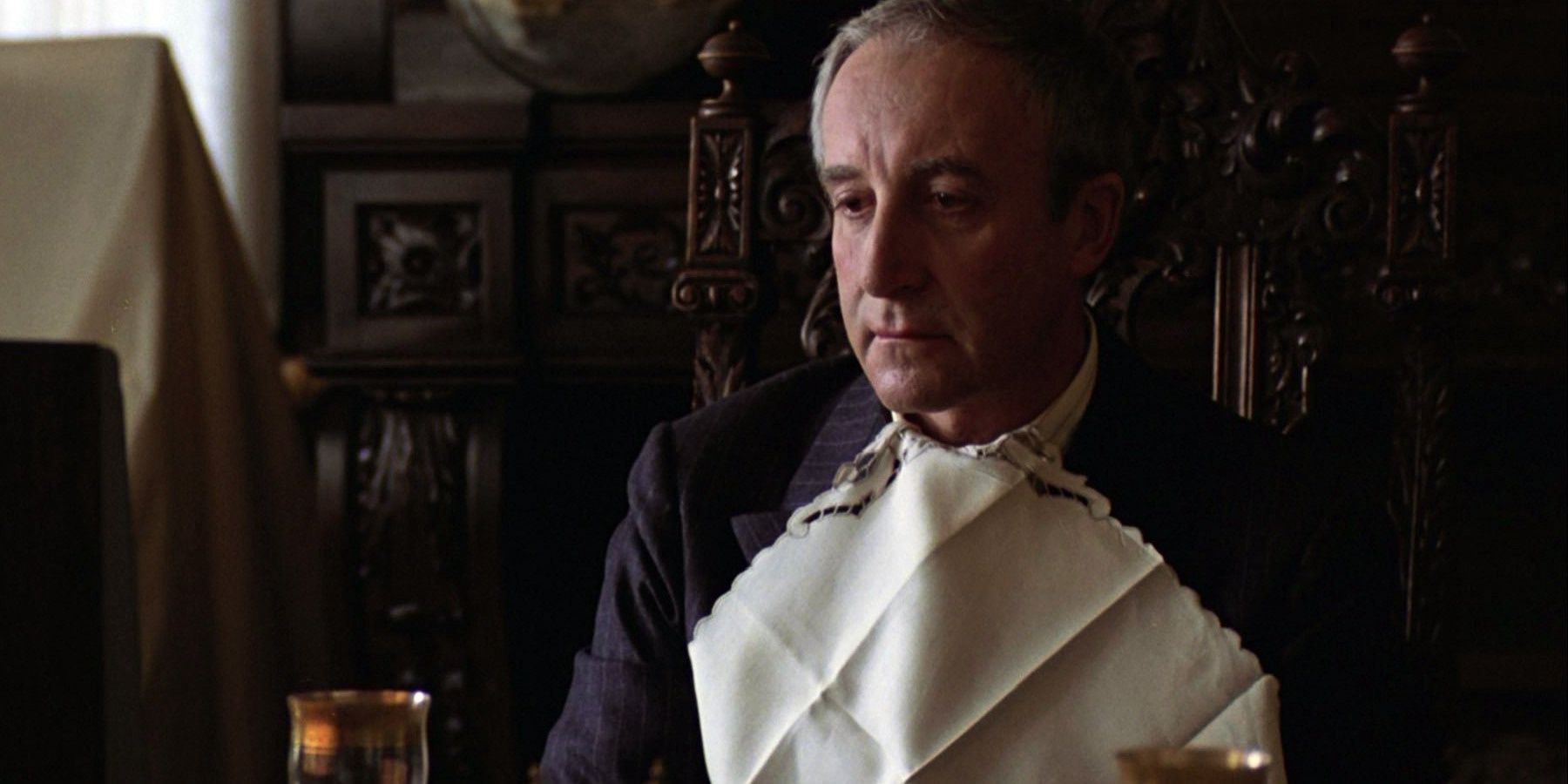 Peter Sellers at dinner table in Being There
