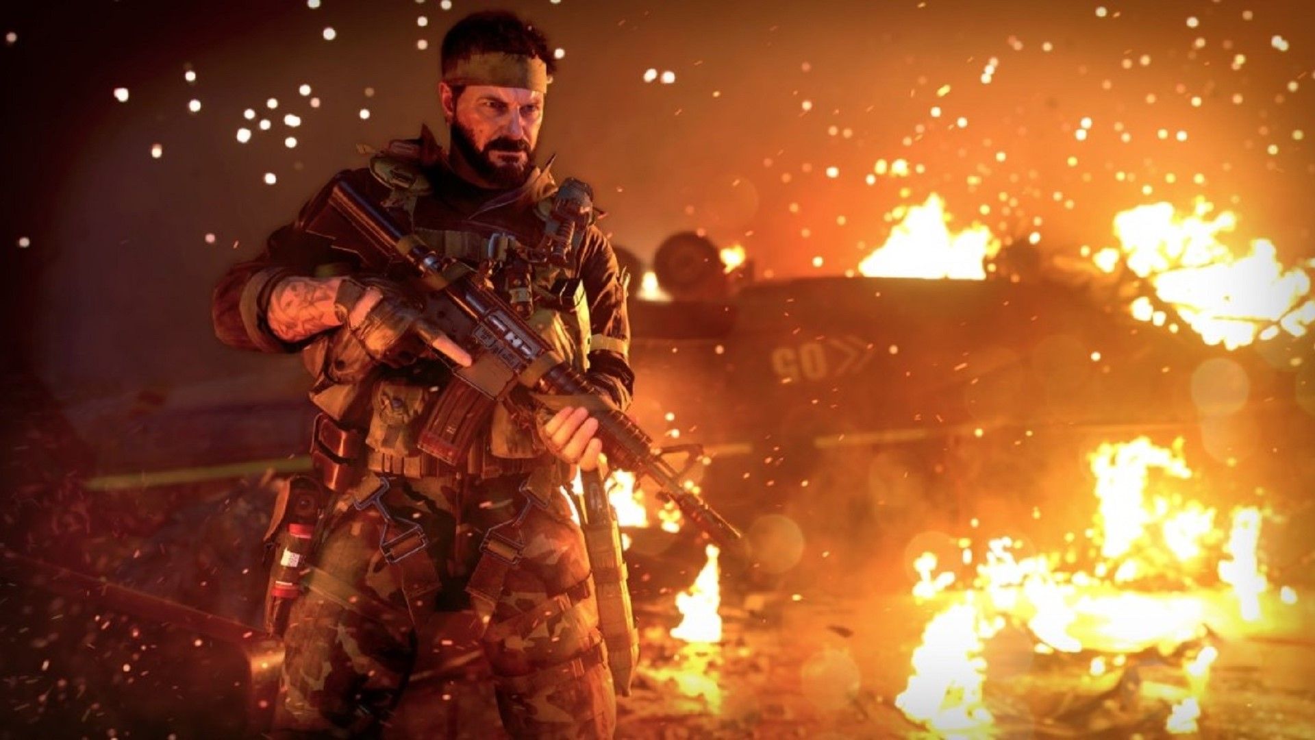 Woods standing in front of burning wreckage in Call of Duty Black Ops: Cold War.