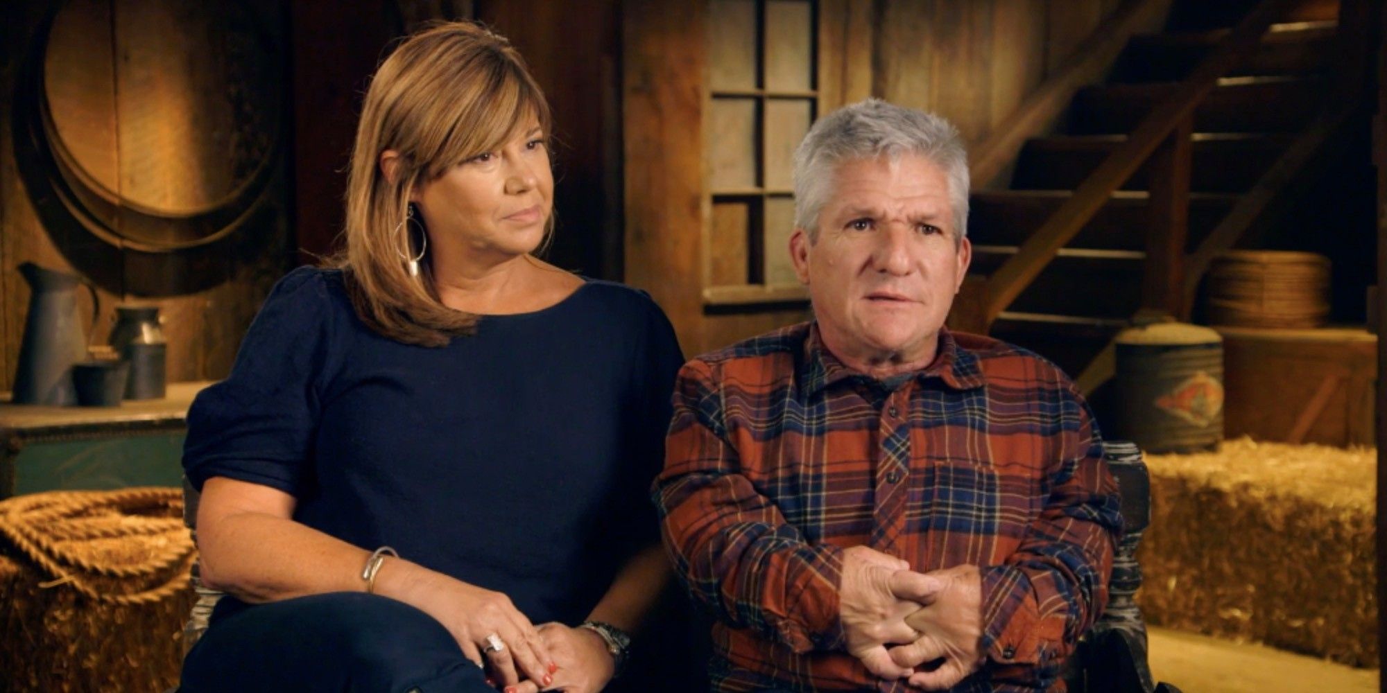 Caryn Chandler and Matt Roloff in Little People, Big World talking to cameras at farm