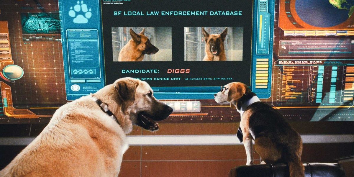 Two dog characters looking at spy computer in Cats &amp; Dogs.