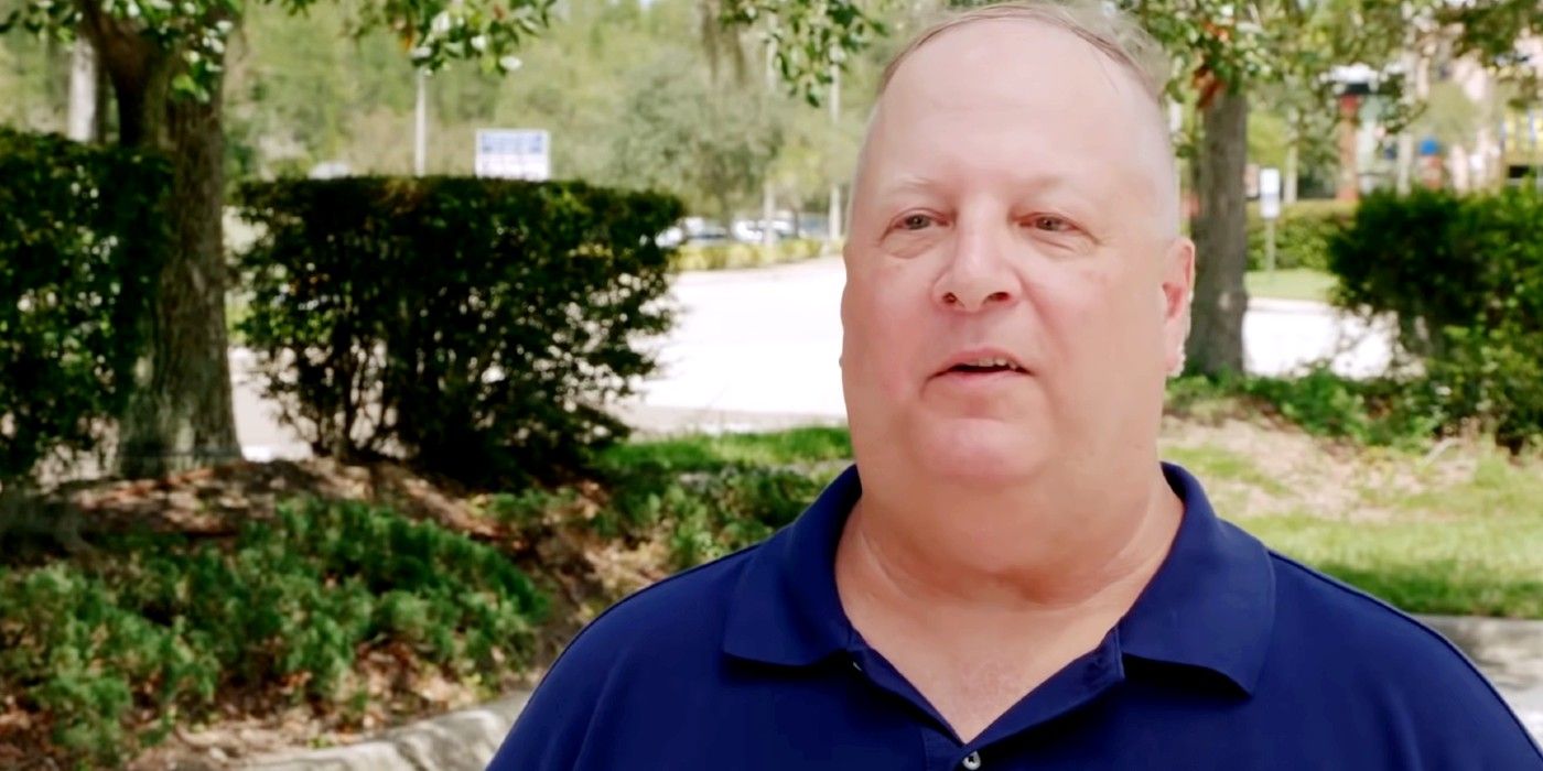 Chuck Potthast In 90 Day Fiancé blue shirt posing outside