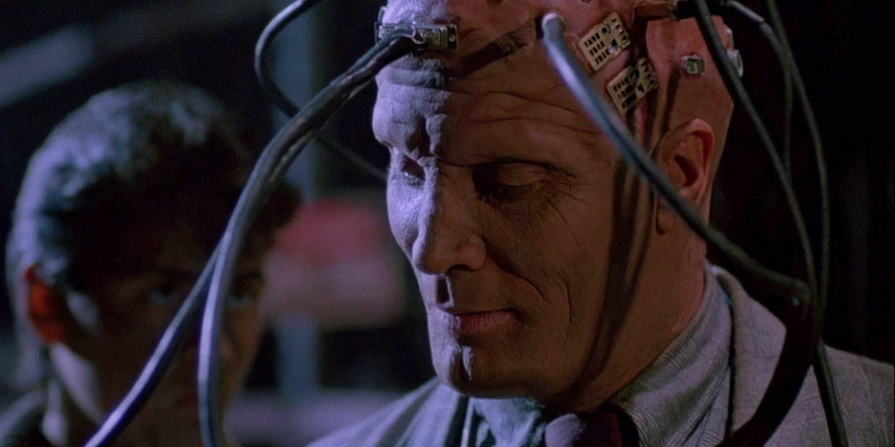 Vernon Wells with wires coming out of his head in Circuitry Man