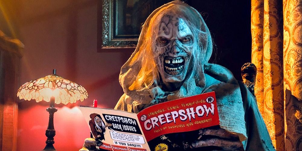 Creepshow's Creep ghoul reading a magazine while scowling at the camera 