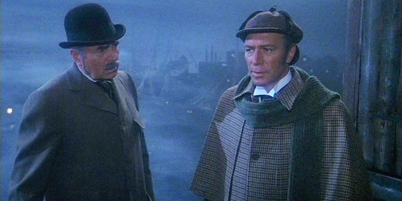 Sherlock Holmes and Doctor Watson walk through London at night in Murder By Decree