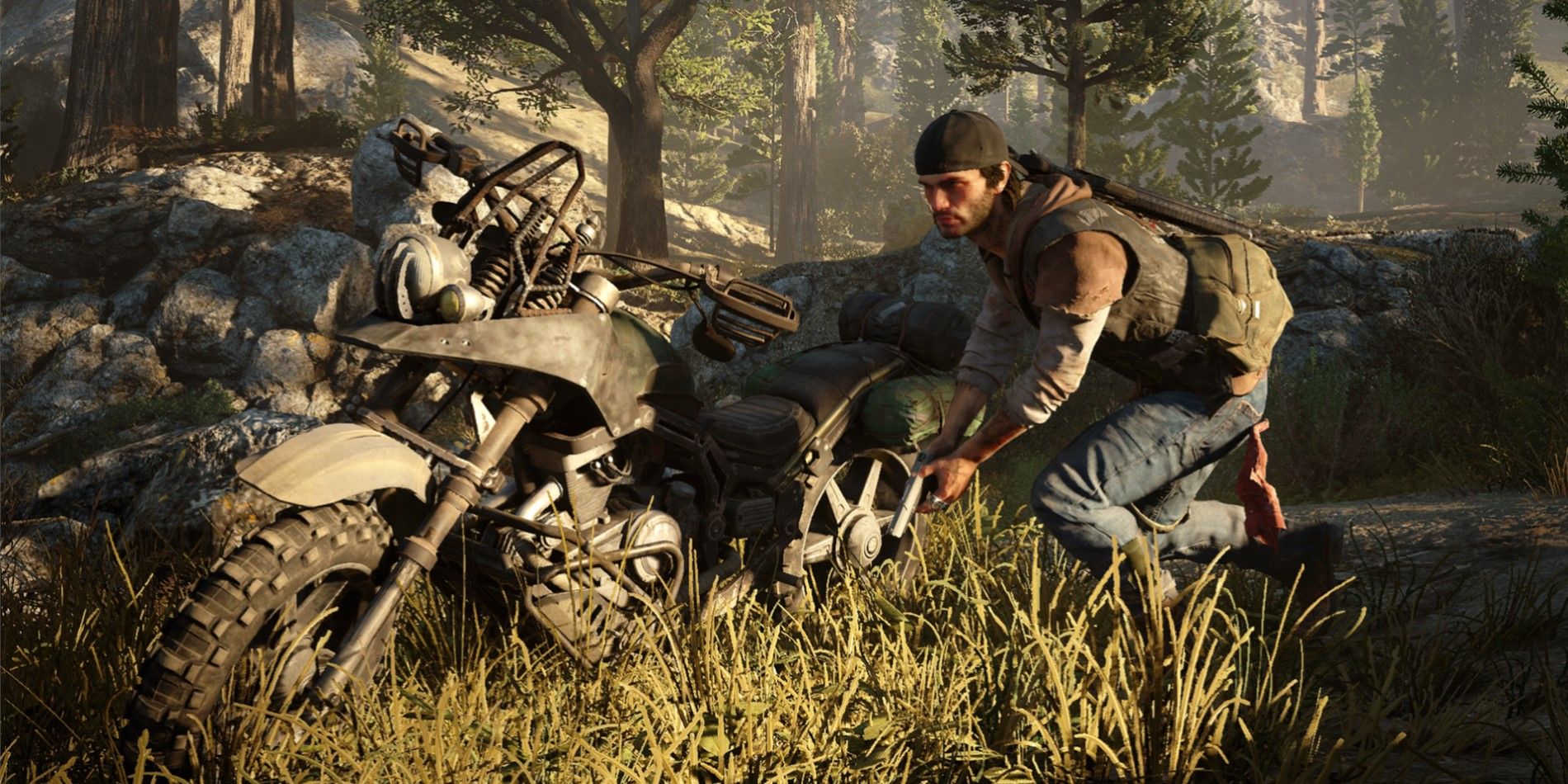 An image of Deacon holding a gun next to his bike in Days Gone.